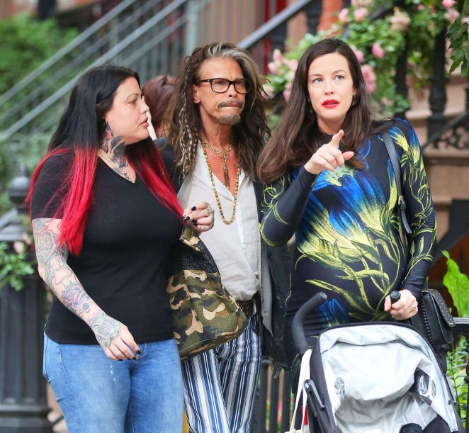 with sister Mia and dad Steven Tyler