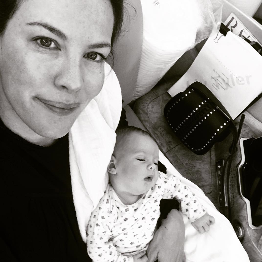 "Australia here we come!!! #theleftovers Momma and Lula back to work, Lula 7 weeks working hard growing, sleeping and being so beautiful. helping me read my script and memorize my lines."