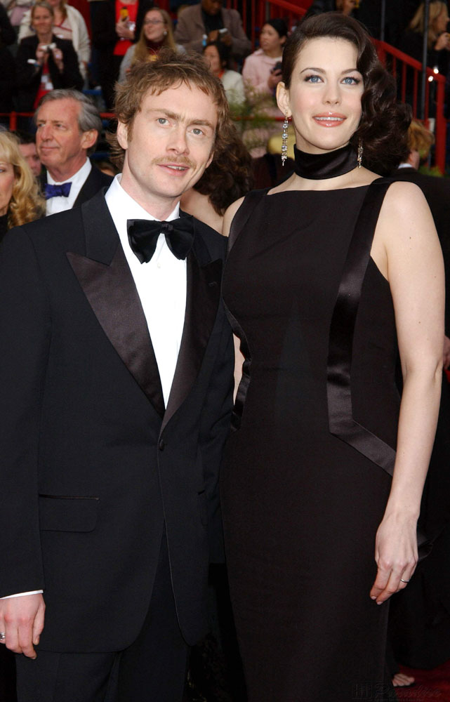 with husband Royston Langdon - at Oscars 2004