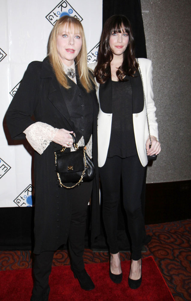 with mom Bebe Buell