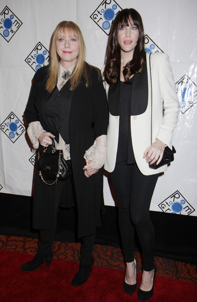 with mom Bebe Buell