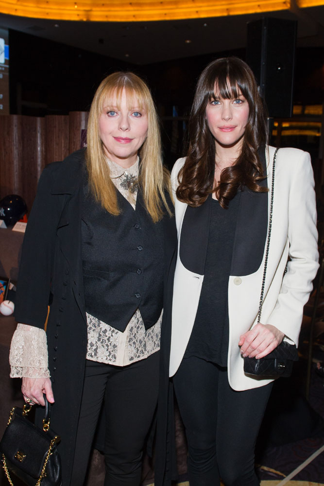 with mom Bebe Buell