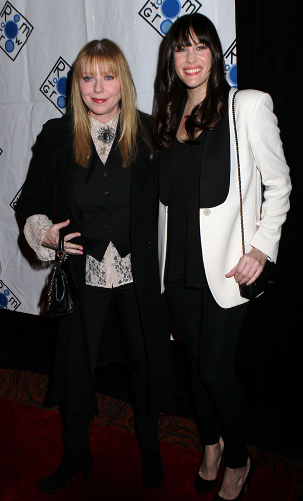 with mom Bebe Buell
