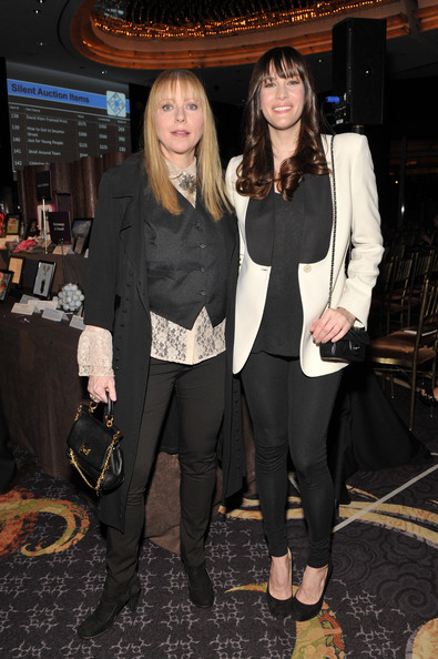 with mom Bebe Buell