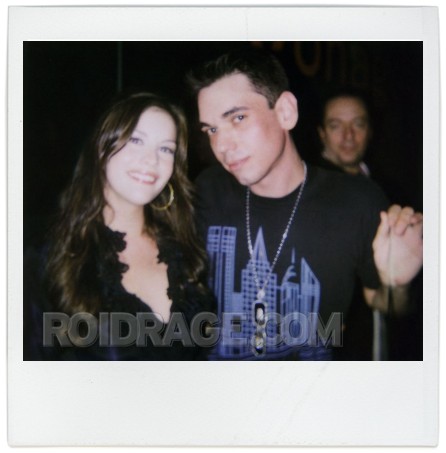 with DJ AM; Courtesy of roidrage.com