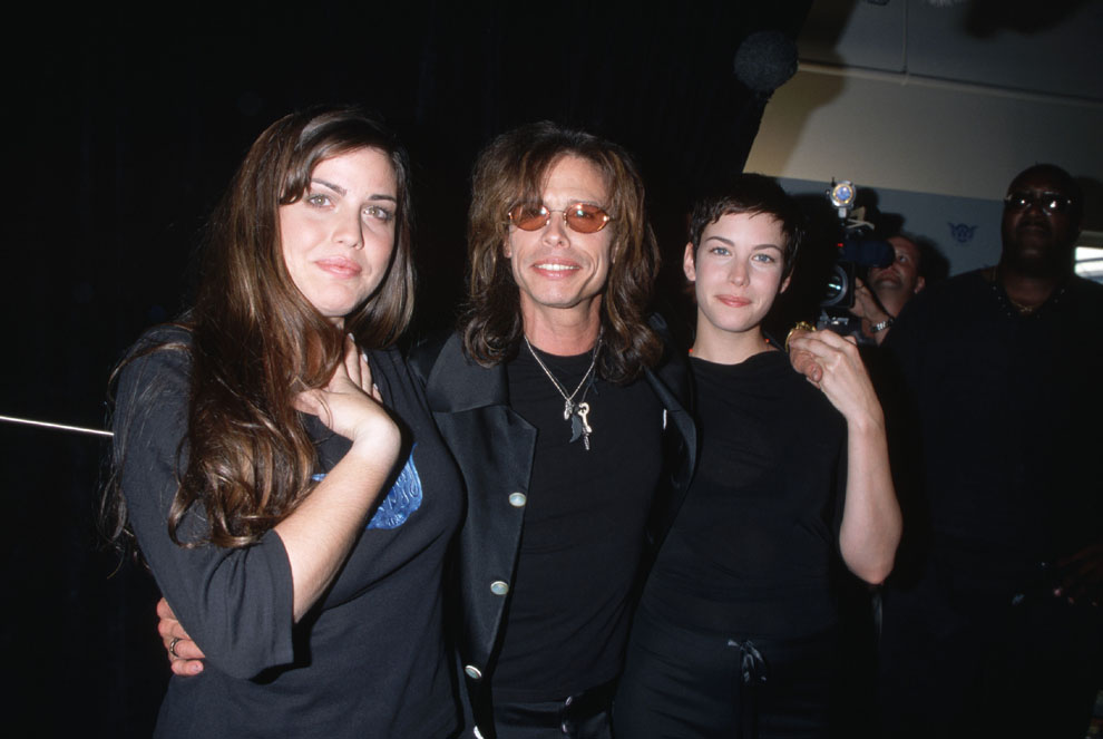 with sister Mia and dad Steven