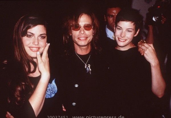 with sister Mia and dad Steven