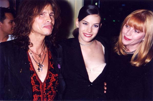 with mom Bebe Buell and dad Steven Tyler