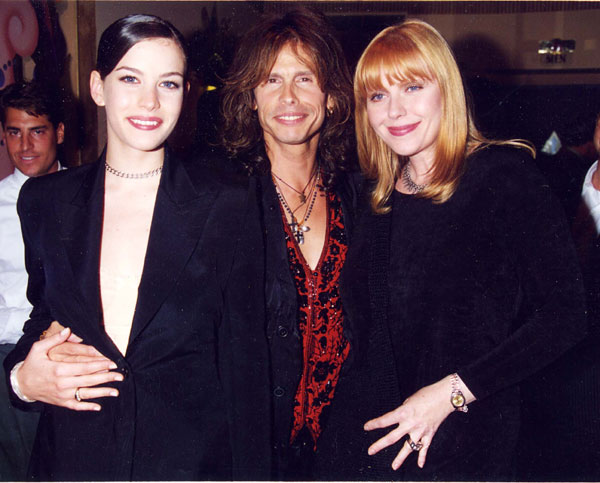 with mom Bebe Buell and dad Steven Tyler