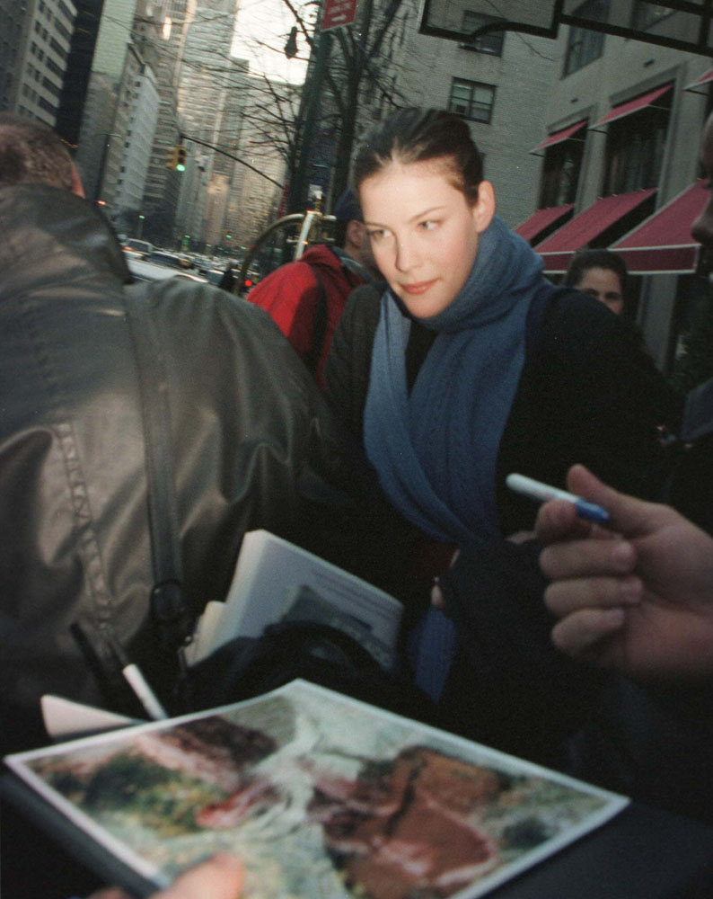Signing autographs outside Regency Hotel in New York