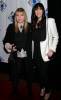 with mom Bebe Buell